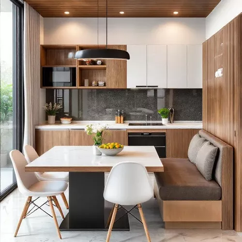Dapur modern dengan kabinet kayu dan meja makan besar, menciptakan suasana akrab di Banjarmasin-kontraktor interior kantor splusa.id Dapur modern dengan kabinet kayu dan meja makan besar, menciptakan suasana akrab di Banjarmasin-kontraktor interior kantor splusa.id