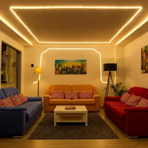 Ruang tamu dengan lampu LED warm white dan sofa berwarna cerah-interior splusa.id