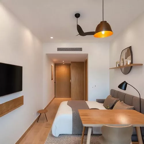 pencahayaan di apartemen studio, seperti penggunaan lampu gantung, lampu dinding, dan lampu lantai-kontraktor interior splusa.id pencahayaan di apartemen studio, seperti penggunaan lampu gantung, lampu dinding, dan lampu lantai-kontraktor interior splusa.id